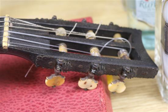 An antique guitar, label for J. Turner